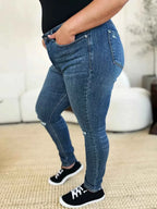 Judy Blue Full Size Mid Waist Distressed Slim Jeans - Faith Beyond Grace