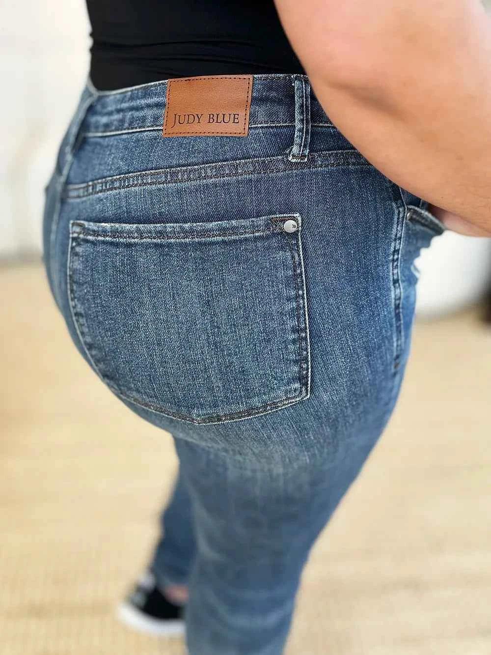 Judy Blue Full Size Mid Waist Distressed Slim Jeans - Faith Beyond Grace