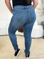 Judy Blue Full Size Mid Waist Distressed Slim Jeans - Faith Beyond Grace