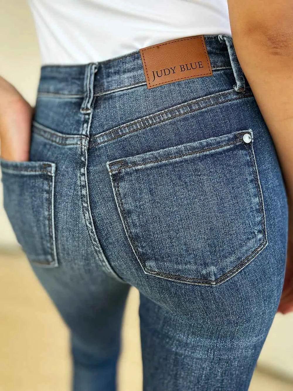 Judy Blue Full Size Mid Waist Distressed Slim Jeans - Faith Beyond Grace